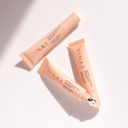 Three YINA Recovery Lip Treatment tubes on a light background