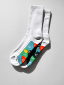YINA reflexology socks flat‑lay on textured speckled carpet